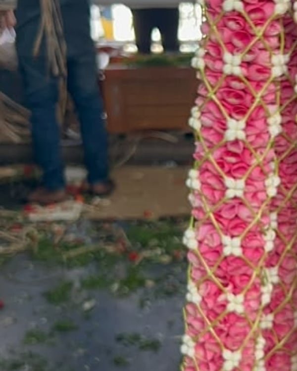 A Sri Garlands garland hanging at the Koyambedu flower market