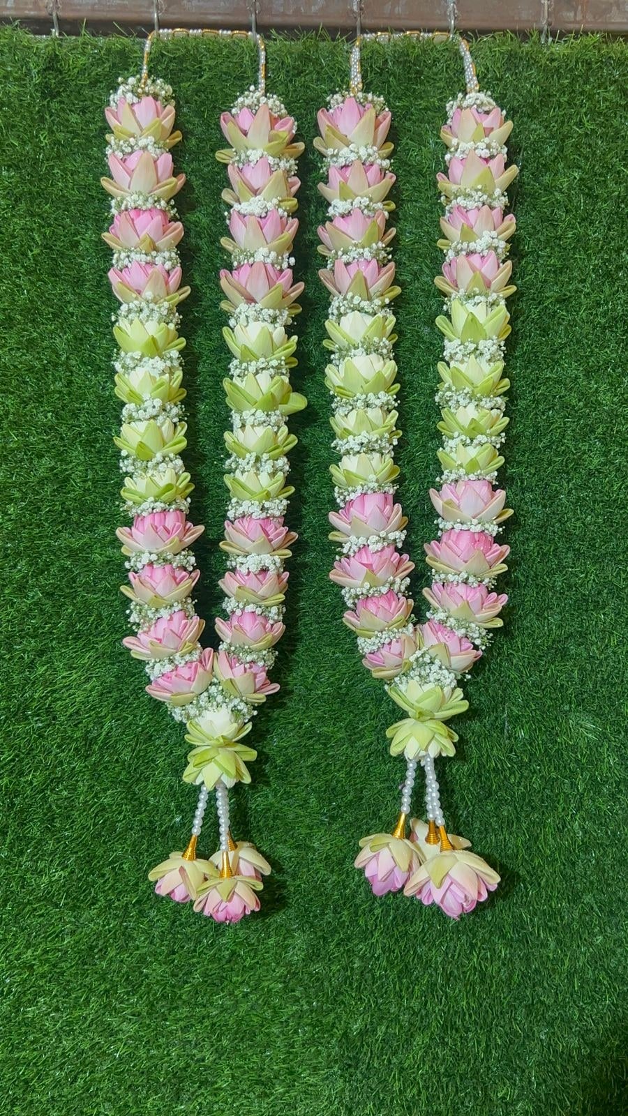 Handmade pink lotus wedding garlands by Sri Garlands